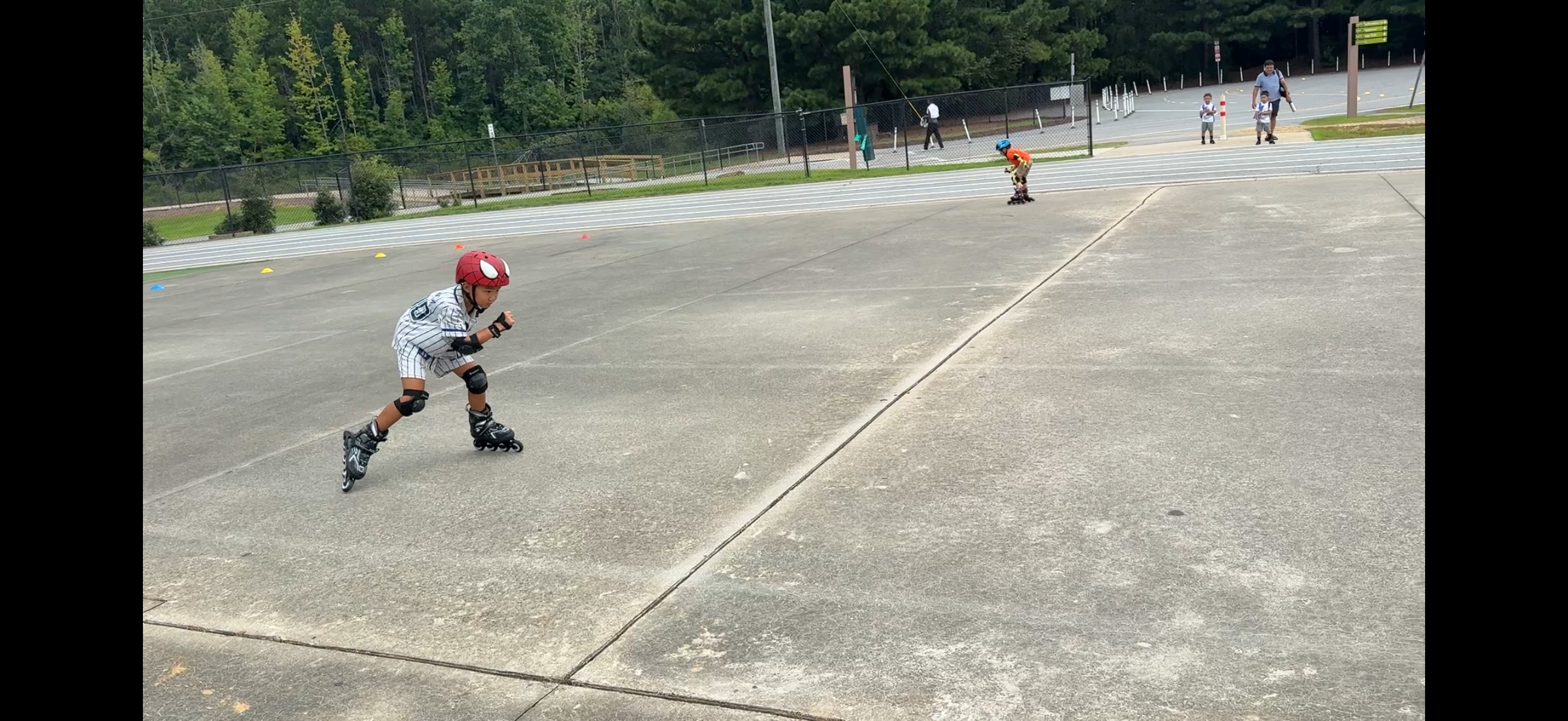 A child practicing inline skating at KAF Academy